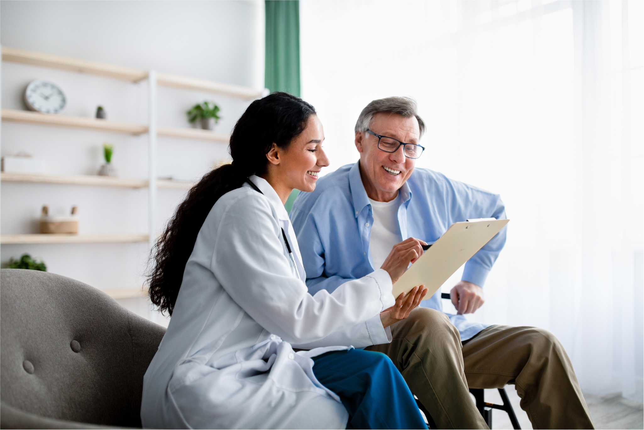 healthcare professional showing a patient a chart